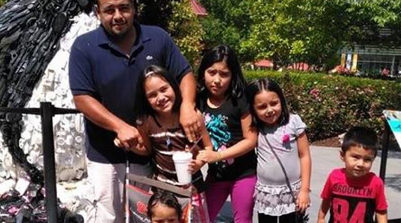 Family Shot: A public GoFundMe site contained this undated picture of the Romero family. The site was set up by a family member and shows Martin Romero and his children. Photo: GoFundMe Romero Family Funeral and Medical Fund.