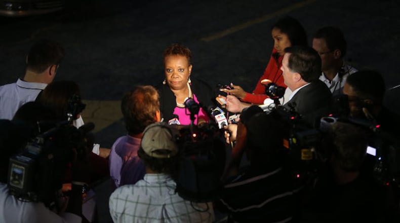 Vickie G. Johnson, who described herself as a 50-year member of Mount Vernon Baptist Church, voted against the deal to sell the church property. She emerged from the church on Thursday night, Sept. 19, 2013, to tell the media the vote count.