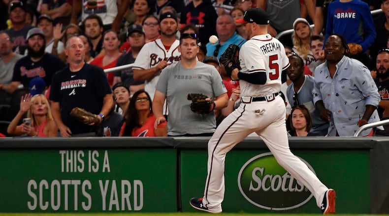 Braves first baseman Freddie Freeman fields a ball in the third inning against the Chicago White Sox Saturday, Aug. 31, 2019, at SunTrust Park in Atlanta.