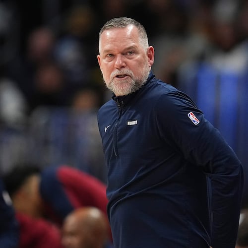 FILE - Denver Nuggets head coach Michael Malone stands on the sideline during the second half of an NBA basketball game April 1, 2025, in Denver. (AP Photo/David Zalubowski, File)