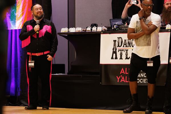 DanceOut Atlanta founders Terence Ng moderates dance competitions during the Hoedown South convention on Aug. 1, 2026 in Atlanta. (Estela Muñoz/AJC) 