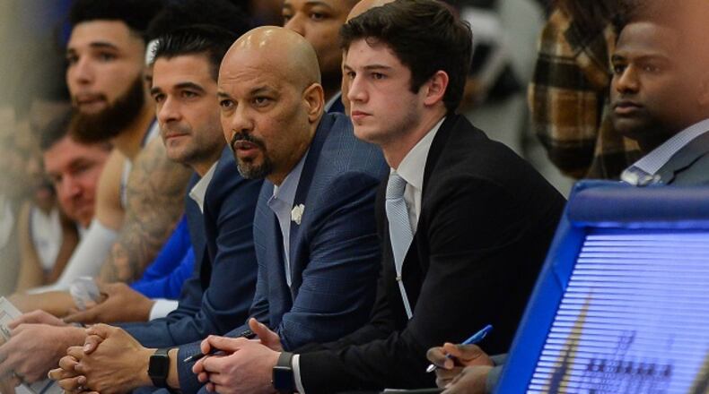 Georgia state coach Rob Lanier (third from left) looks on.  Photo by Rich von Biberstein