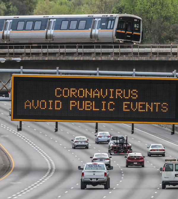 Georgia Department of Transportation  electronic signs across the metro are displaying COVID-19 messages for motorists, this one on Northbound I-85 near the Brookwood exchange. Photographed on March 30, 2020. JOHN SPINK/JSPINK@AJC.COM