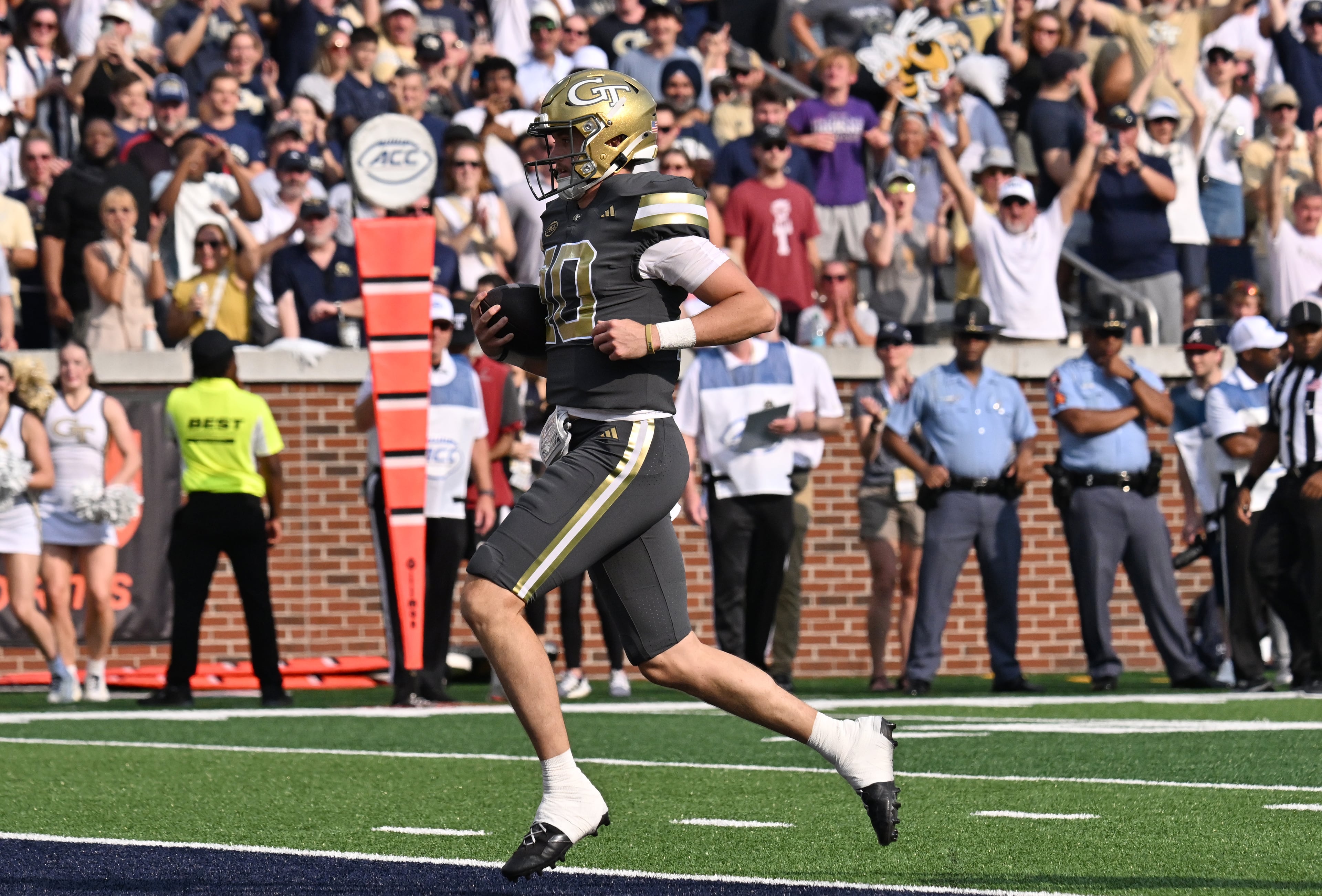 Georgia Tech quarterback Haynes King scores a touchdown during the first half of an NCAA college football game at Georgia Tech's Bobby Dodd Stadium, Saturday, Sept. 20, 2025 in Atlanta. (Hyosub Shin/AJC)
