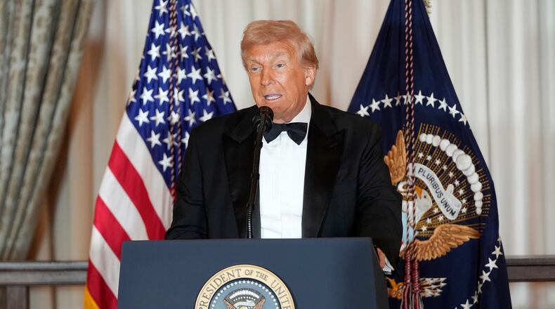 President Donald Trump speaks at a Kennedy Center Honors reception for recipients Sylvester Stallone, George Strait, Kiss, Gloria Gaynor and Michael Crawford at the State Department, Saturday, Dec. 6, 2025, in Washington. (AP Photo/Julia Demaree Nikhinson)