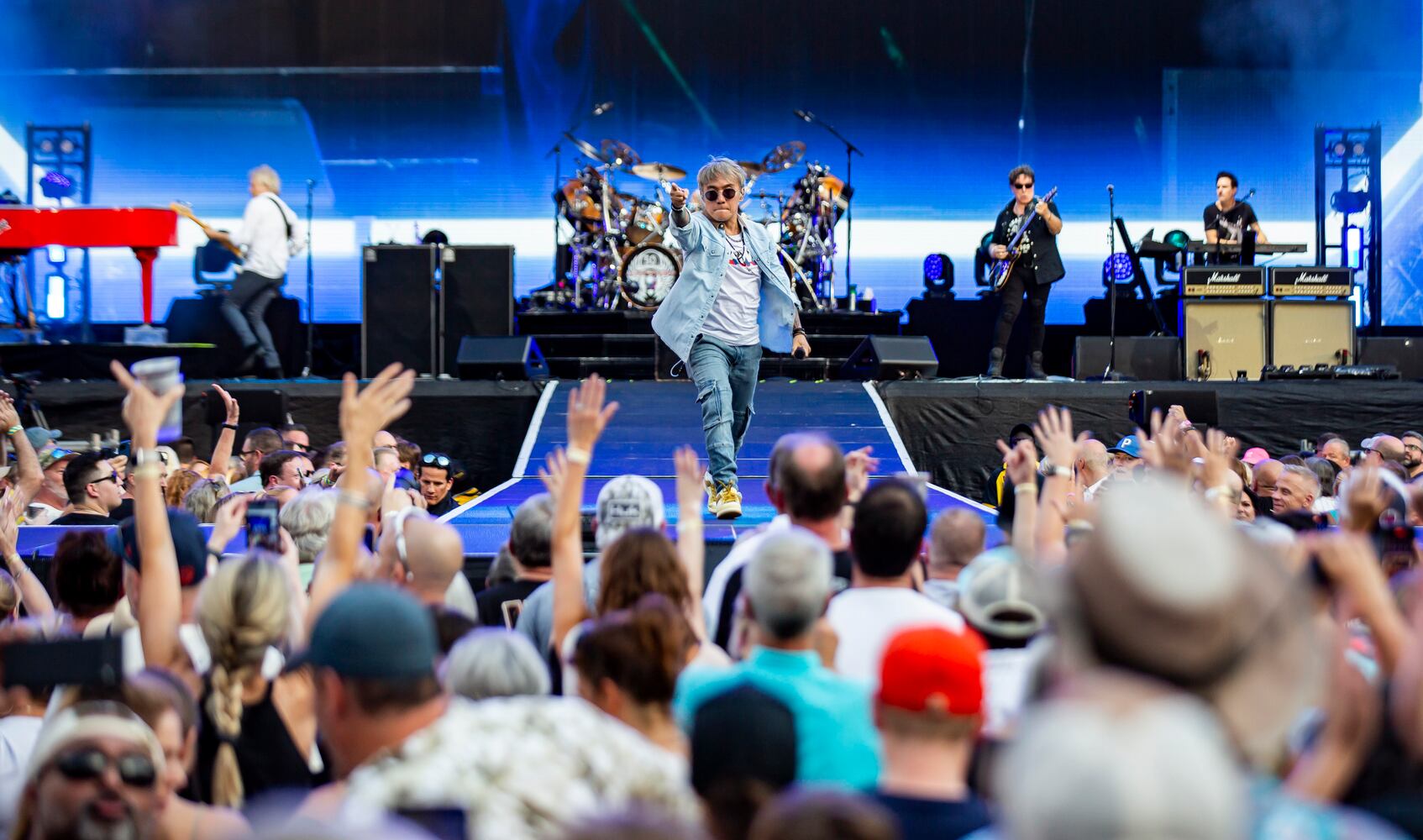 Journey blasted through their mega hits with Arnel Pineda commanding the crowd with his vocal chops at a concert with Def Leppard at Truist Park in Atlanta on July 13, 2024. (RYAN FLEISHER FOR THE ATLANTA JOURNAL-CONSTITUTION)