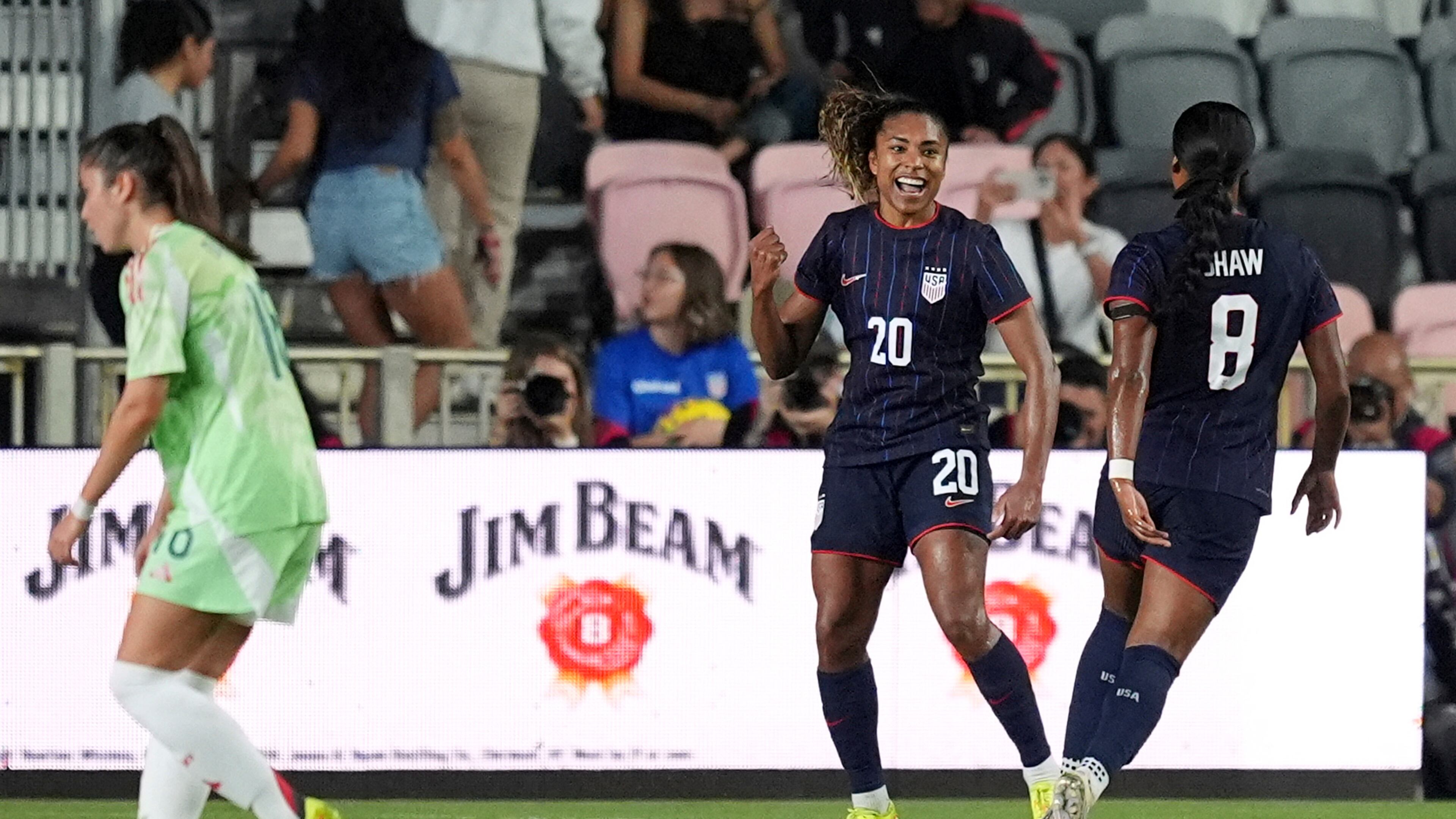 United States forward Catarina Macario (20) celebrates after scoring her side's first goal against Italy during the first half of an international friendly soccer match, Monday, Dec. 1, 2025, in Fort Lauderdale, Fla. (AP Photo/Rebecca Blackwell)