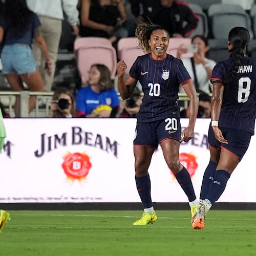 United States forward Catarina Macario (20) celebrates after scoring her side's first goal against Italy during the first half of an international friendly soccer match, Monday, Dec. 1, 2025, in Fort Lauderdale, Fla. (AP Photo/Rebecca Blackwell)