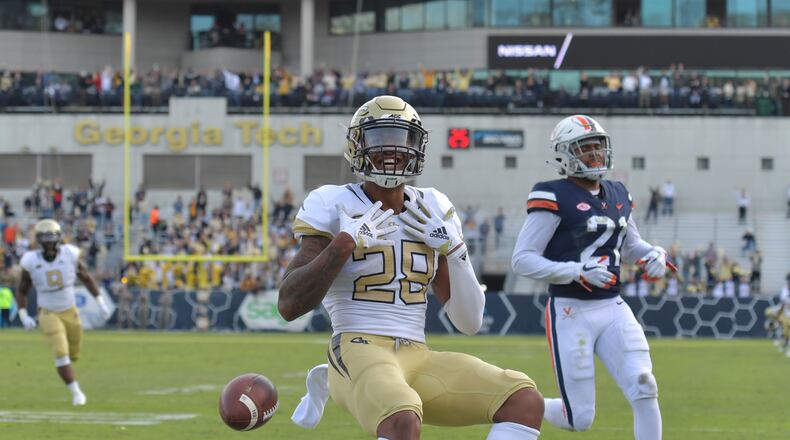 November 17, 2018 Atlanta - Georgia Tech defensive back Juanyeh Thomas (28) celebrates after he scored a touchdown in the first half at Bobby Dodd Stadium on Saturday, November 17, 20. HYOSUB SHIN / HSHIN@AJC.COM