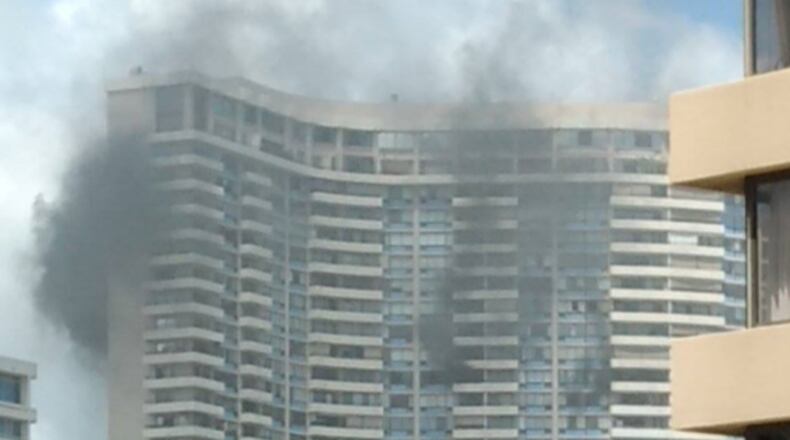 A five-alarm fire at a Honolulu high-rise Friday killed at least three people, the city's mayor said.