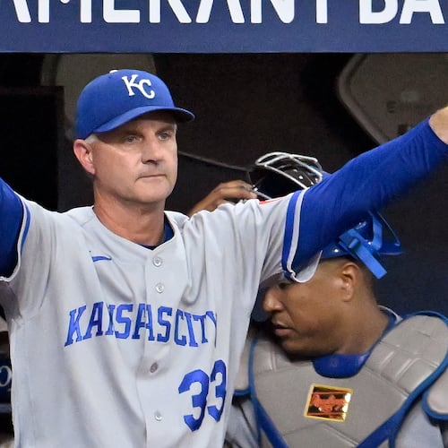 Kansas City Royals manager Matt Quatraro makes a lineup change during the ninth inning of a baseball game against the Tampa Bay Rays Tuesday, June 23, 2026, in St. Petersburg, Fla. (AP Photo/Jason Behnken)