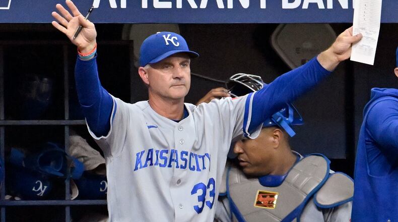 Kansas City Royals manager Matt Quatraro makes a lineup change during the ninth inning of a baseball game against the Tampa Bay Rays Tuesday, June 23, 2026, in St. Petersburg, Fla. (AP Photo/Jason Behnken)