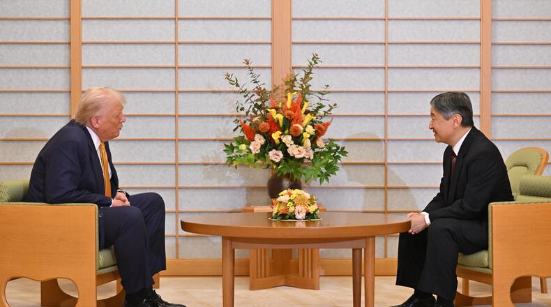 President Donald Trump, left, and Japan's Emperor Naruhito talk during their meeting at the Imperial Palace in Tokyo, Oct. 27, 2025. (Kazuhiro Nogi/Pool Photo via AP)