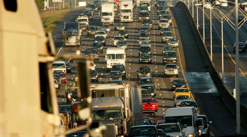 A traffic jam seen here in 2009 at I-75 and Windy Hill Road caused a 13-mile backup to Wade Green Road. Windy Hill already has a diverging diamond interchange, and the county just announced Wade Green is also getting one.