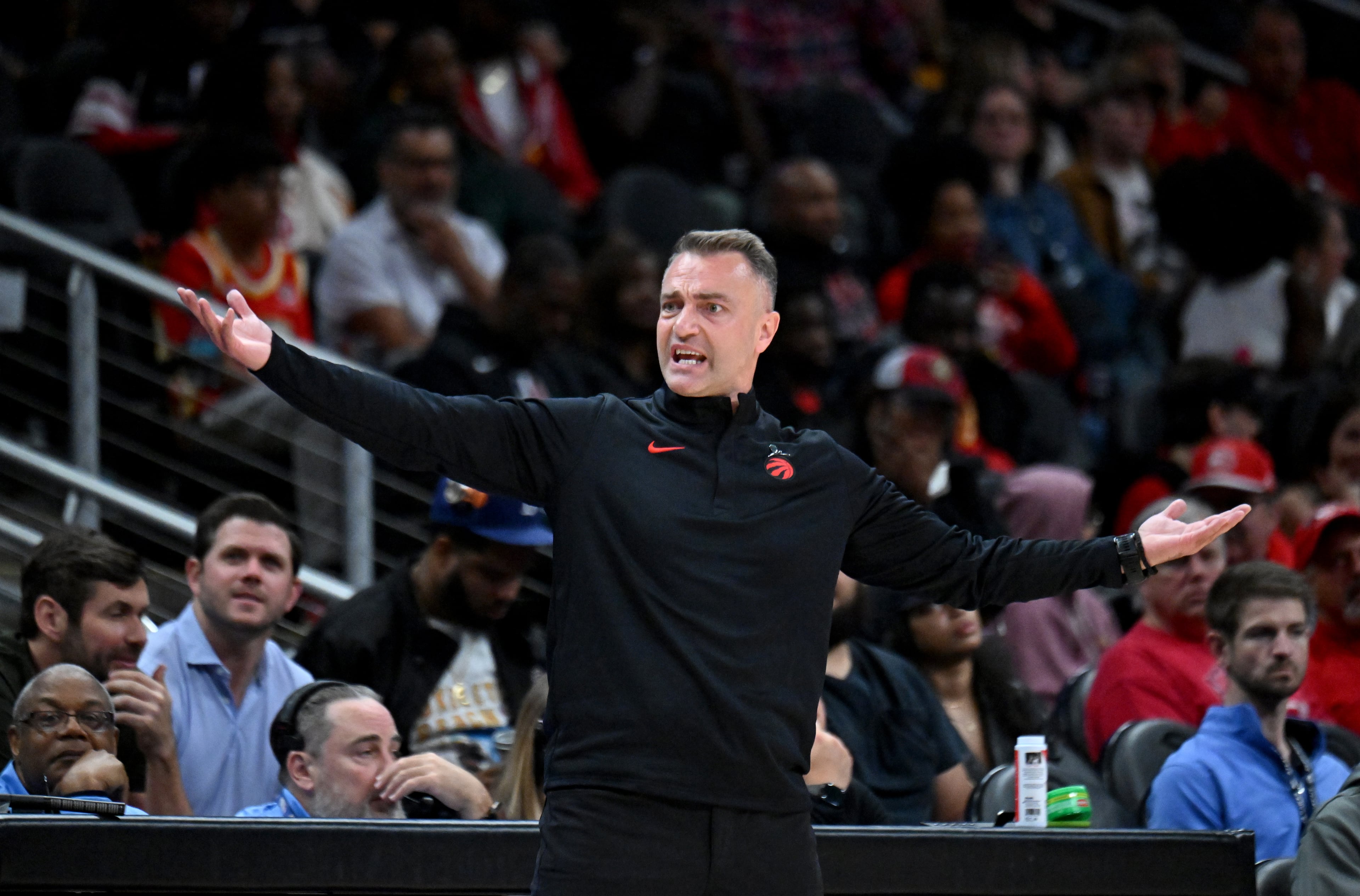 Toronto Raptors Head Coach Darko Rajakovic reacts to no-call during the second half in the home opener at State Farm Arena, Thursday, October 22, 2025, in Atlanta. Toronto Raptors won 138-118 over Atlanta Hawks. (Hyosub Shin / AJC)