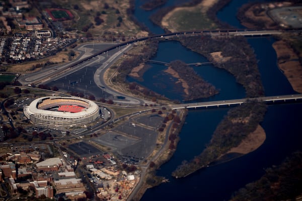 FILE - RFK Stadium is visible from Air Force One as it takes off from Andrews Air Force Base, Md., Nov. 29, 2017. (AP Photo/Andrew Harnik, File)