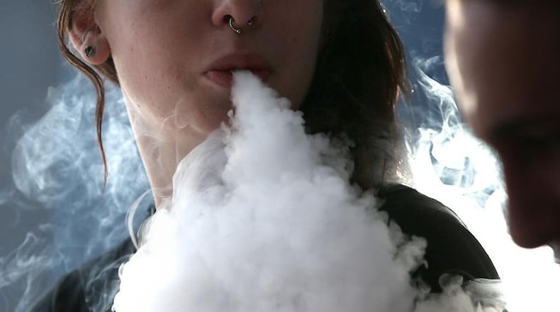 Vaping would be banned from Milton city parks under an ordinance update pending before the City Council. AJC FILE