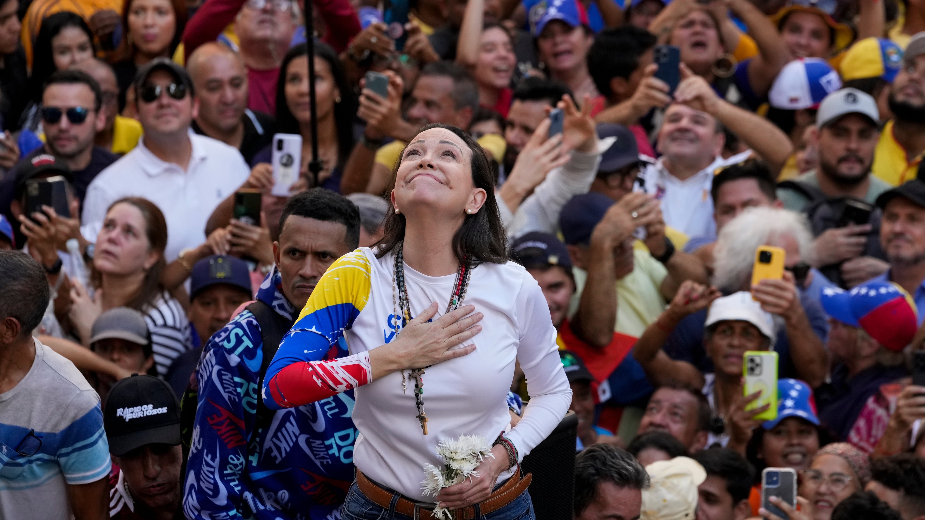 FILE - Venezuelan opposition leader Maria Corina Machado addresses supporters at a protest against President Nicolas Maduro in Caracas, Venezuela, Jan. 9, 2025, the day before his inauguration for a third term. (AP Photo/Ariana Cubillos, File)
