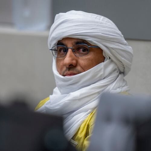 FILE - Al Hassan Ag Abdoul Aziz Ag Mohamed Ag Mahmoud waits for judges to enter the courtroom of the International Criminal Court in The Hague, Netherlands, on June 26, 2024, to deliver the verdict in the trial of Al Hassan, accused of playing a key role in a reign of terror unleashed by al-Qaida-linked insurgents on the historic desert city of Timbuktu in northern Mali in 2012. (AP Photo/Peter Dejong, Pool, File)