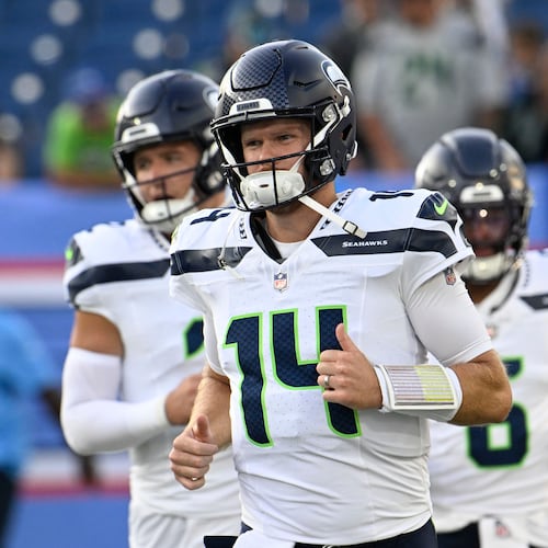 Seattle Seahawks quarterback Sam Darnold (14) warms up before a preseason NFL football game against the Tennessee Titans, Sunday, Aug. 23, 2026, in Nashville, Tenn. (AP Photo/John Amis)