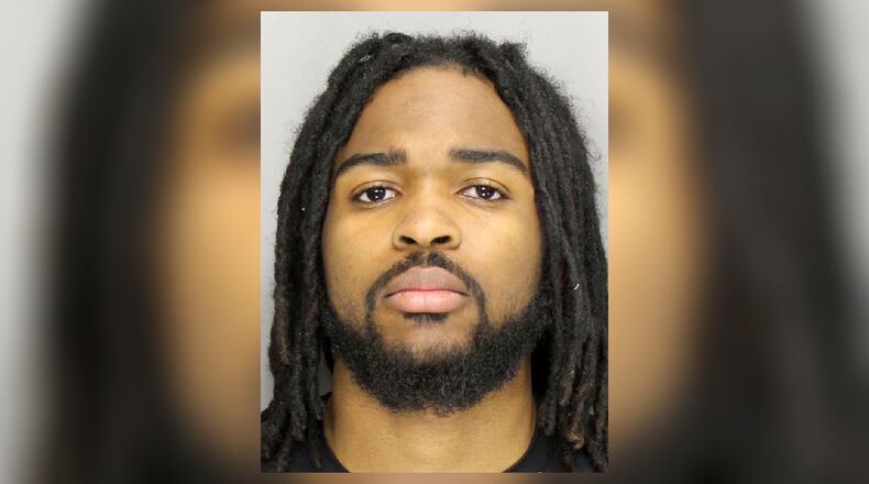 Shakim Holloman told Cobb County police he believed he fell asleep before a fatal crash Sunday morning.