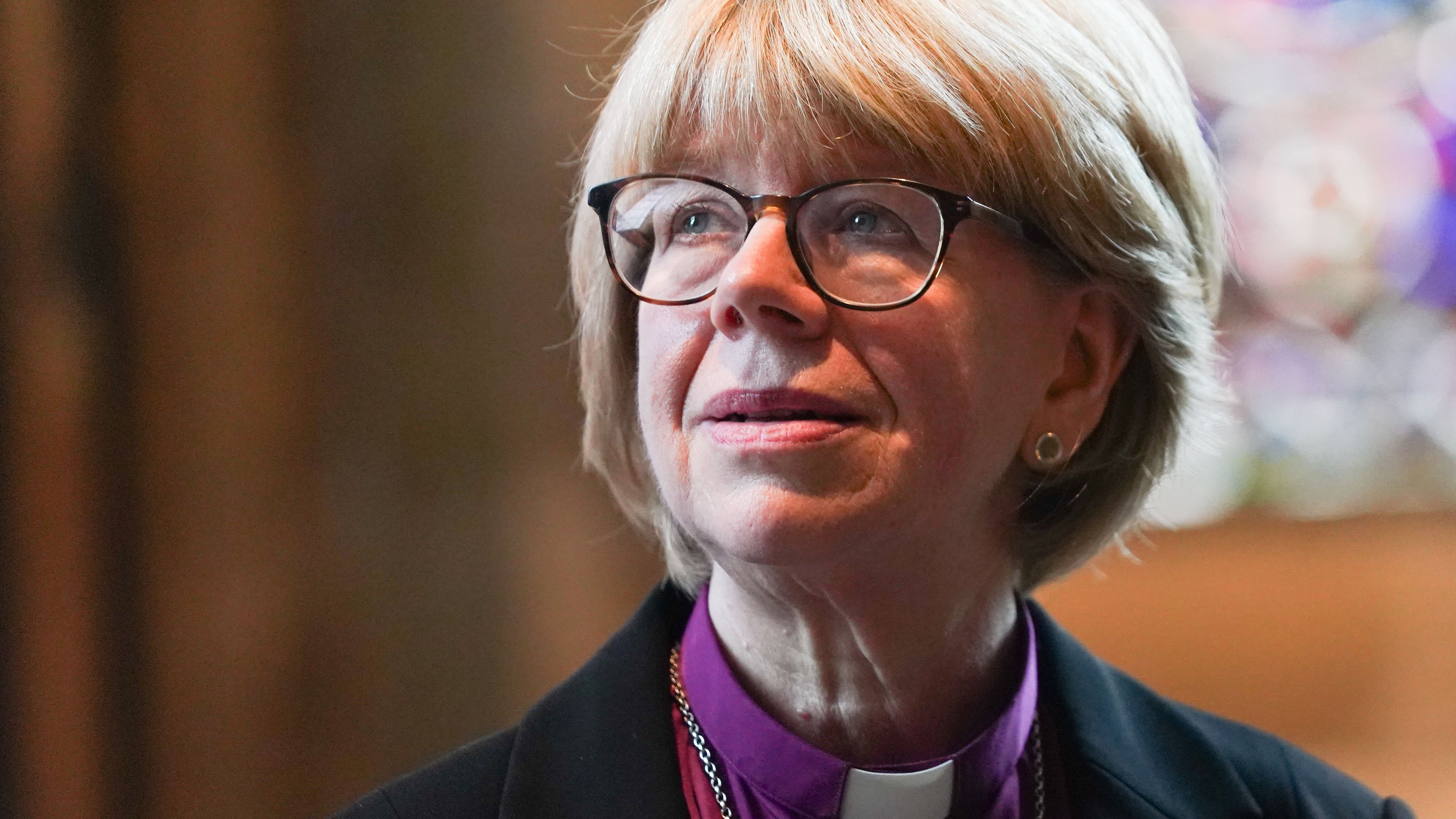 Sarah Mullally, the new Archbishop of Canterbury, spiritual leader of the world's 85 million Anglicans, poses for the media inside Canterbury Cathedral in Canterbury, England, Friday, Oct. 3, 2025. (AP Photo/Alberto Pezzali)