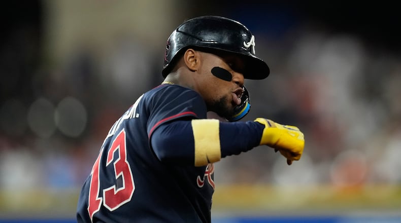 Braves right fielder Ronald Acuña Jr. celebrates after hitting a grand slam against the Astros on Saturday, Sept. 19, 2026, in Houston. The Braves open a three-game series Tuesday at Truist Park. (Ashley Landis/AP)