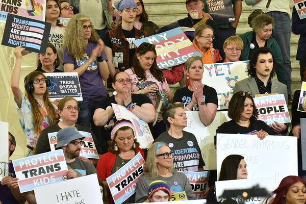 Demonstrators on Transgender Day of Visibility rally at the Pennsylvania Capitol, Monday, March 31, 2025, in Harrisburg, Pa. (AP Photo/Marc Levy)
