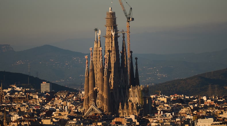 View of the Sagrada Familia basilica, which became the world's tallest church on Thursday after a section of its central tower was lifted into place, in Barcelona, Spain, Oct. 30, 2025. (AP Photo/Emilio Morenatti)