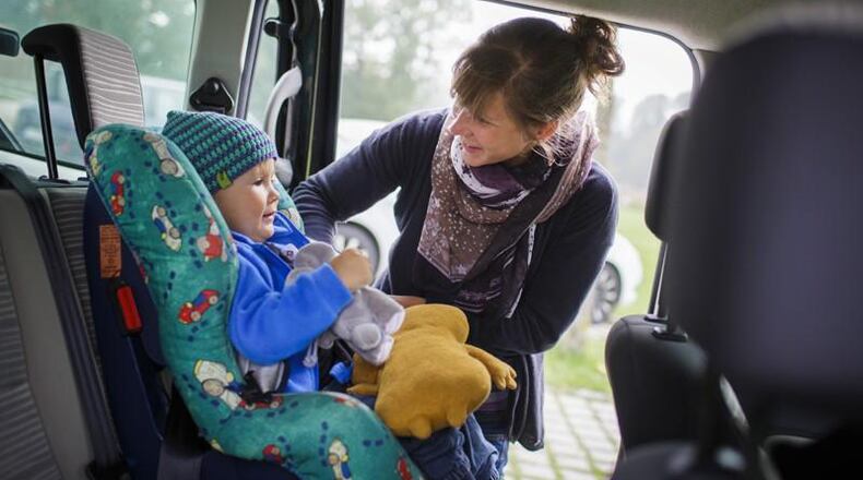 Roswell has received a state grant to provide car seats to financially eligible families and to teach parents and caregivers how to property use the safety devices. AJC FILE