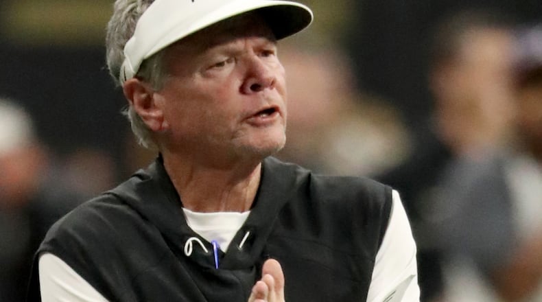 Colquitt County head coach Rush Propst cheers on players after a touchdown in the second half against McEachern during the Corky Kell Classic at Mercedes-Benz Stadium Saturday, Aug. 18, 2018, in Atlanta. Colquitt County won 41-7.  (Jason Getz/For the AJC)
