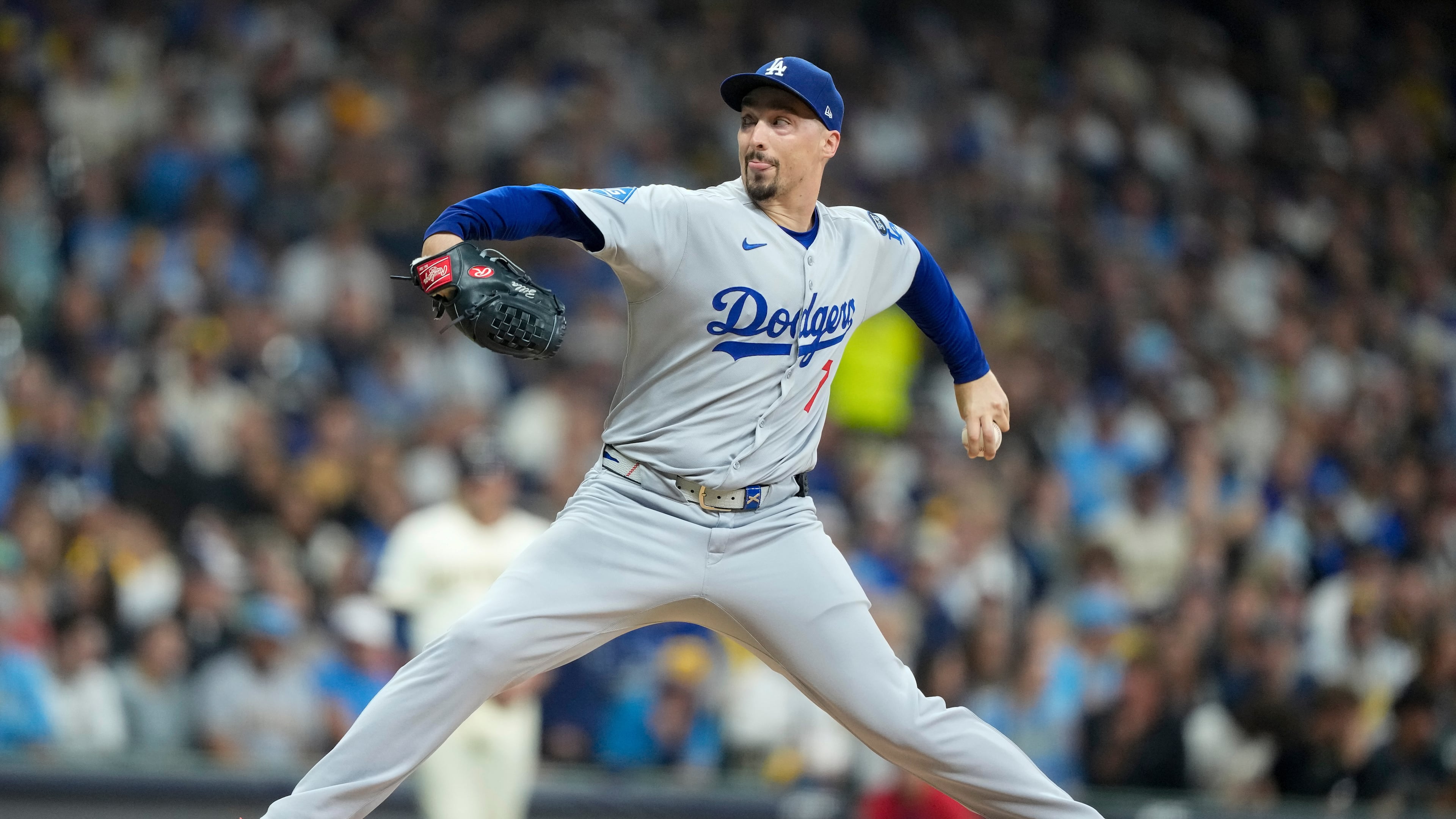 Los Angeles Dodgers pitcher Blake Snell throws against the Milwaukee Brewers during the second inning in Game 1 of baseball's National League Championship Series, Monday, Oct. 13, 2025, in Milwaukee. (AP Photo/Brynn Anderson)