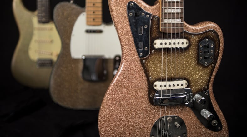 Among the collection at Songbirds Guitar Museum in Chattanooga, Tenn., is, (left to right) a 1963 Fender Stratocaster in Champagne Sparkle, a 1964 Fender Telecaster in Gold Sparkle and a 1966 Fender Jaguar in Pink Champagne Sparkle. CONTRIBUTED BY SONGBIRDS GUITAR MUSEUM