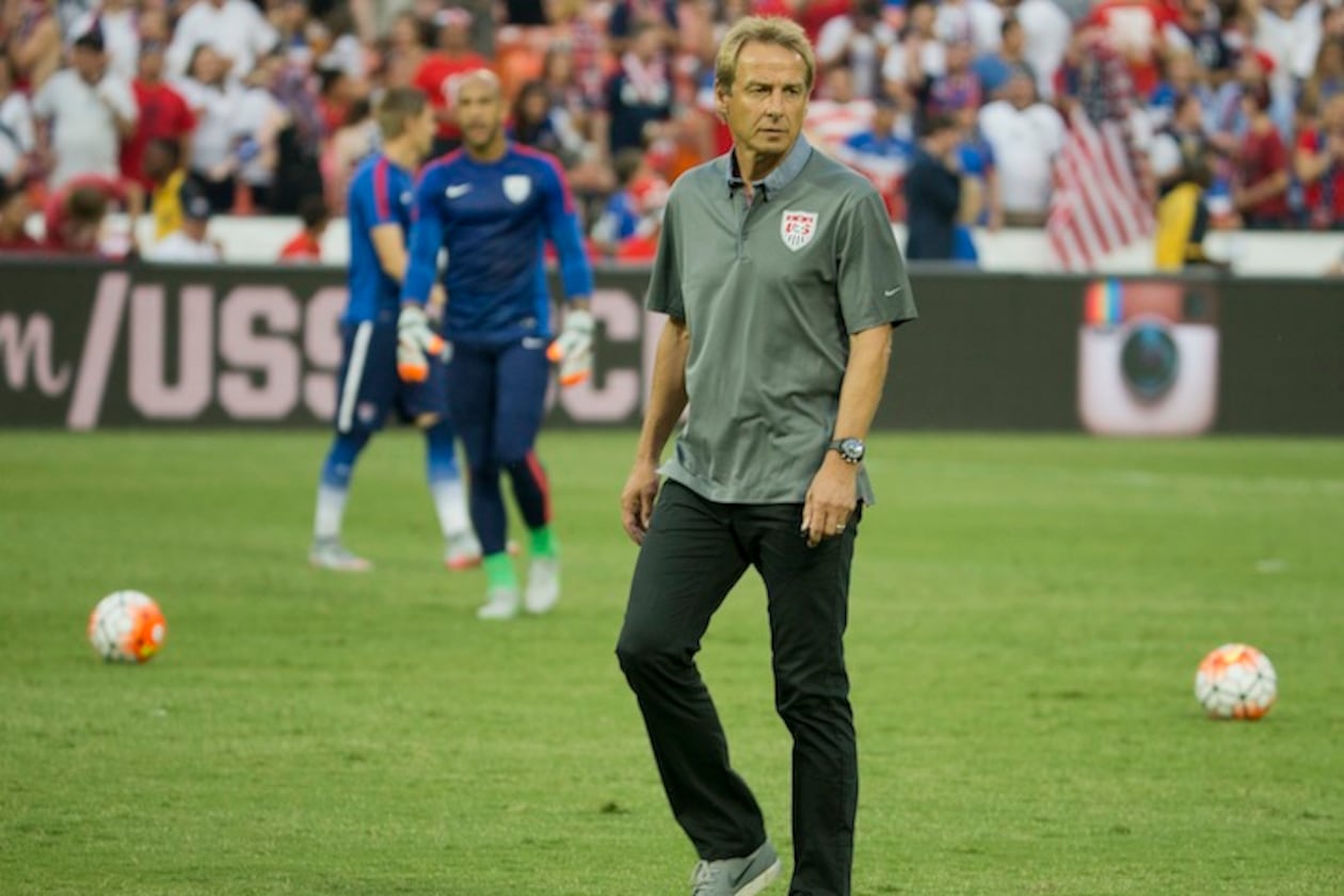 U.S. head soccer coach Jurgen Klinsmann watches his players warm up prior to start of an international friendly soccer match against Peru, Friday, Sept. 4, 2015, at RFK Stadium in Washington. (Pablo Martinez Monsivais/AP)