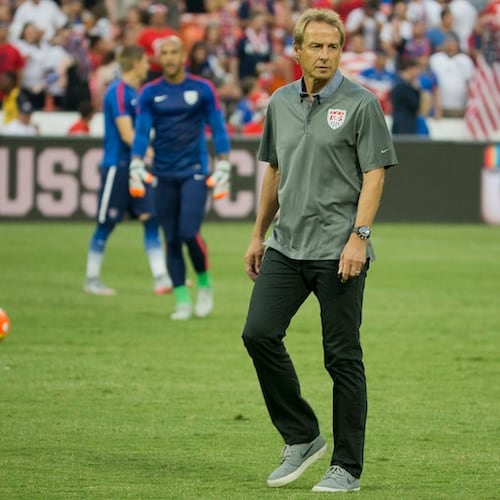 U.S. head soccer coach Jurgen Klinsmann watches his players warm up prior to start of an international friendly soccer match against Peru, Friday, Sept. 4, 2015, at RFK Stadium in Washington. (Pablo Martinez Monsivais/AP)