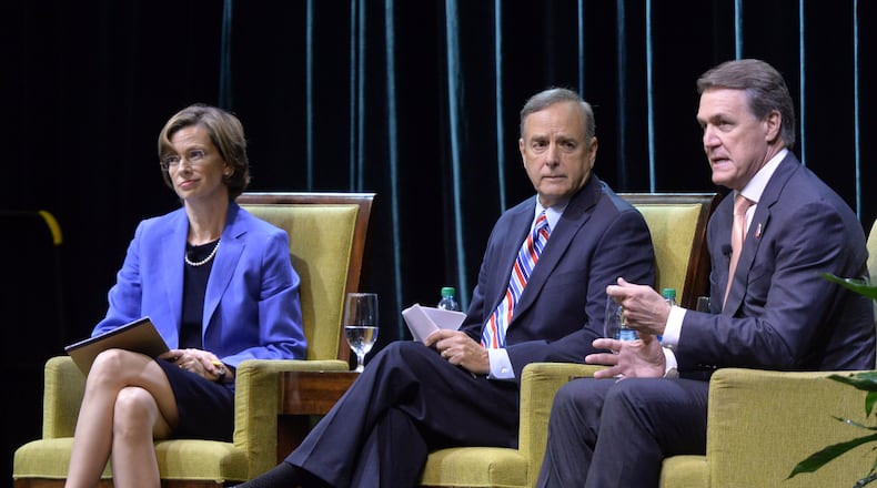 AUGUST 21, 2014 MACON U.S. Senate candidates Michelle Nunn and David Perdue participate in a forum sponsored by the Georgia Chamber at the Marriott City Center in Macon, Thursday, August 21, 2014. Moderator John Pruitt is at center. Over 1100 people came out to hear what they would do for Georgians if elected to the U.S. Senate in the November election. KENT D. JOHNSON / KDJOHNSON@AJC.COM U.S. Senate candidate Michelle Nunn makes a point as she and her Republican opponent David Perdue participate in a forum sponsored by the Georgia Chamber in August. Kent D. Johnson, kdjohnson@ajc.com