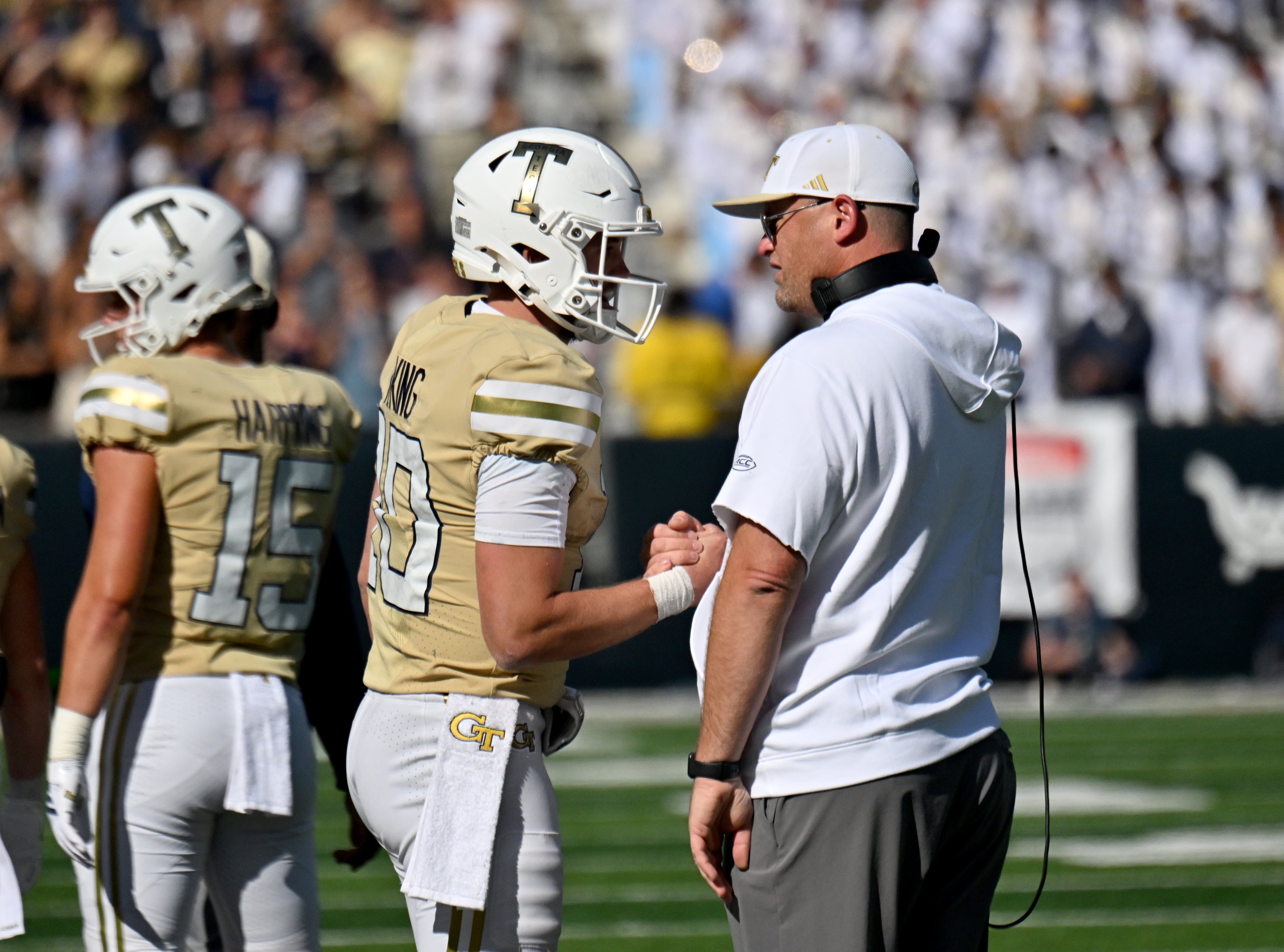 Georgia Tech quarterback Haynes King (second from left) celebrates with Georgia Tech head coach Brent Key after scoring a touchdown during the second half in an NCAA college football game at Bobby Dodd Stadium, Saturday, Oct. 25, 2025 in Atlanta. Georgia Tech won 41-16 over Syracuse. The Yellow Jackets are 8-0 for the first time since 1966 and 5-0 in the ACC for the first time ever. (Hyosub Shin/AJC)