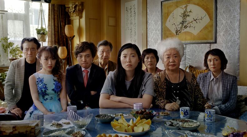 Jiang Yongbo (from left), Aoi Mizuhara, Chen Han, Tzi Ma, Awkwafina, Li Xiang, Lu Hong and Diana Lin star in “The Farewell.” A24