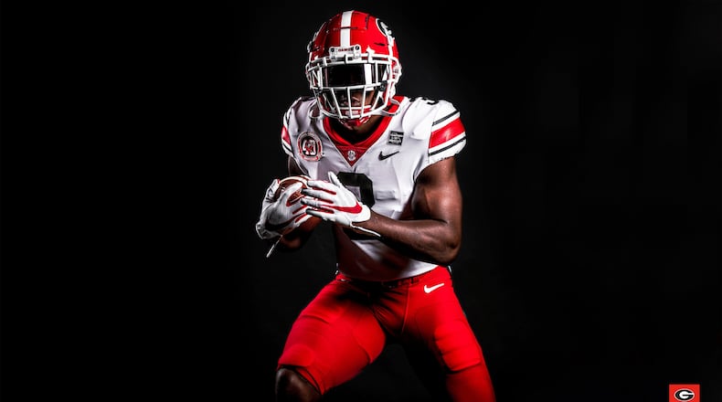 Georgia will play with a uniform combination that features red pants.