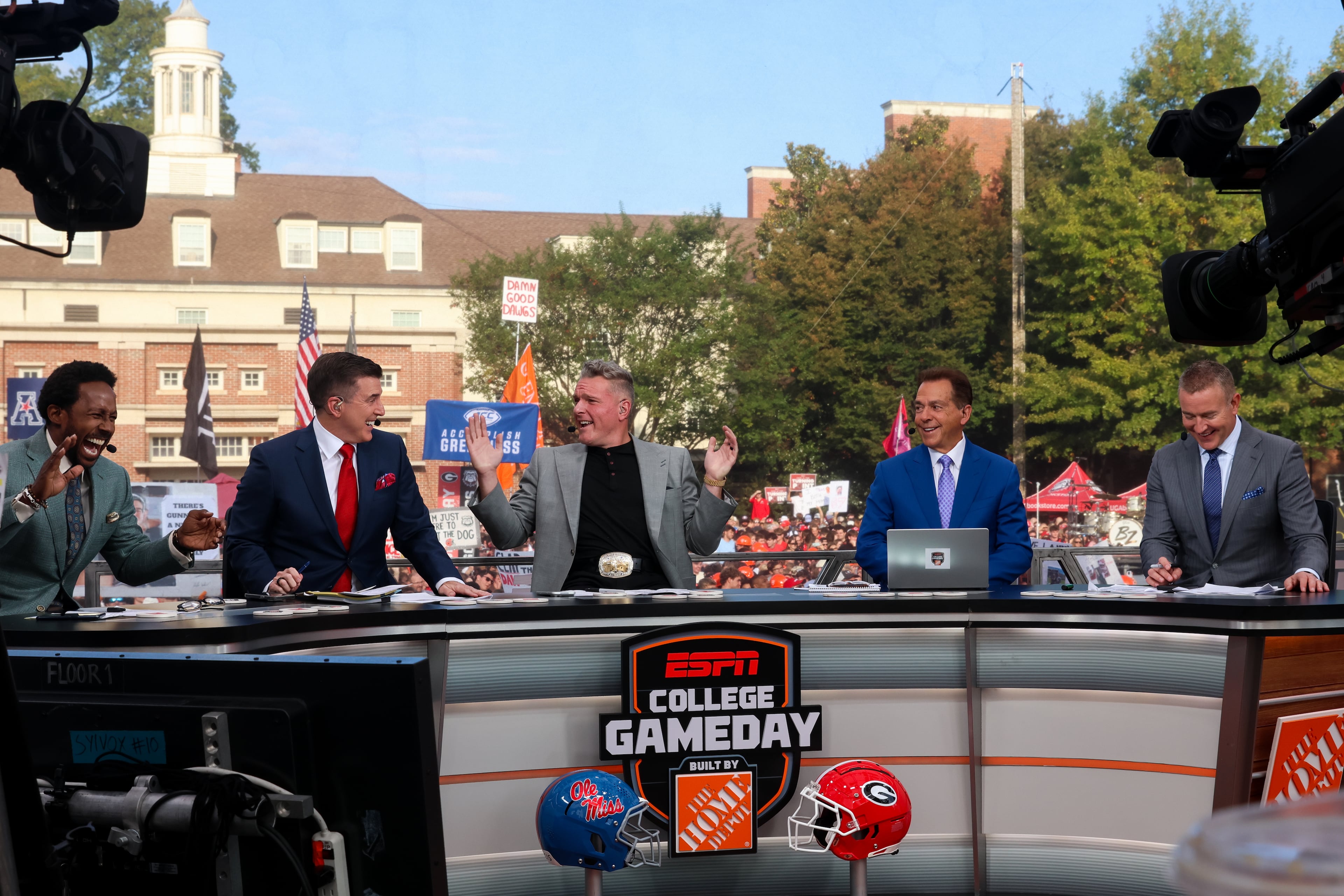 From left, Desmond Howard, Rece Davis, Pat McAfee, Nick Saban, and Kirk Herbstreit talk football during the ESPN College GameDay broadcast from Myers Quad at UGA on Saturday, Oct. 18, 2025. (C.J. Bartunek for the AJC)