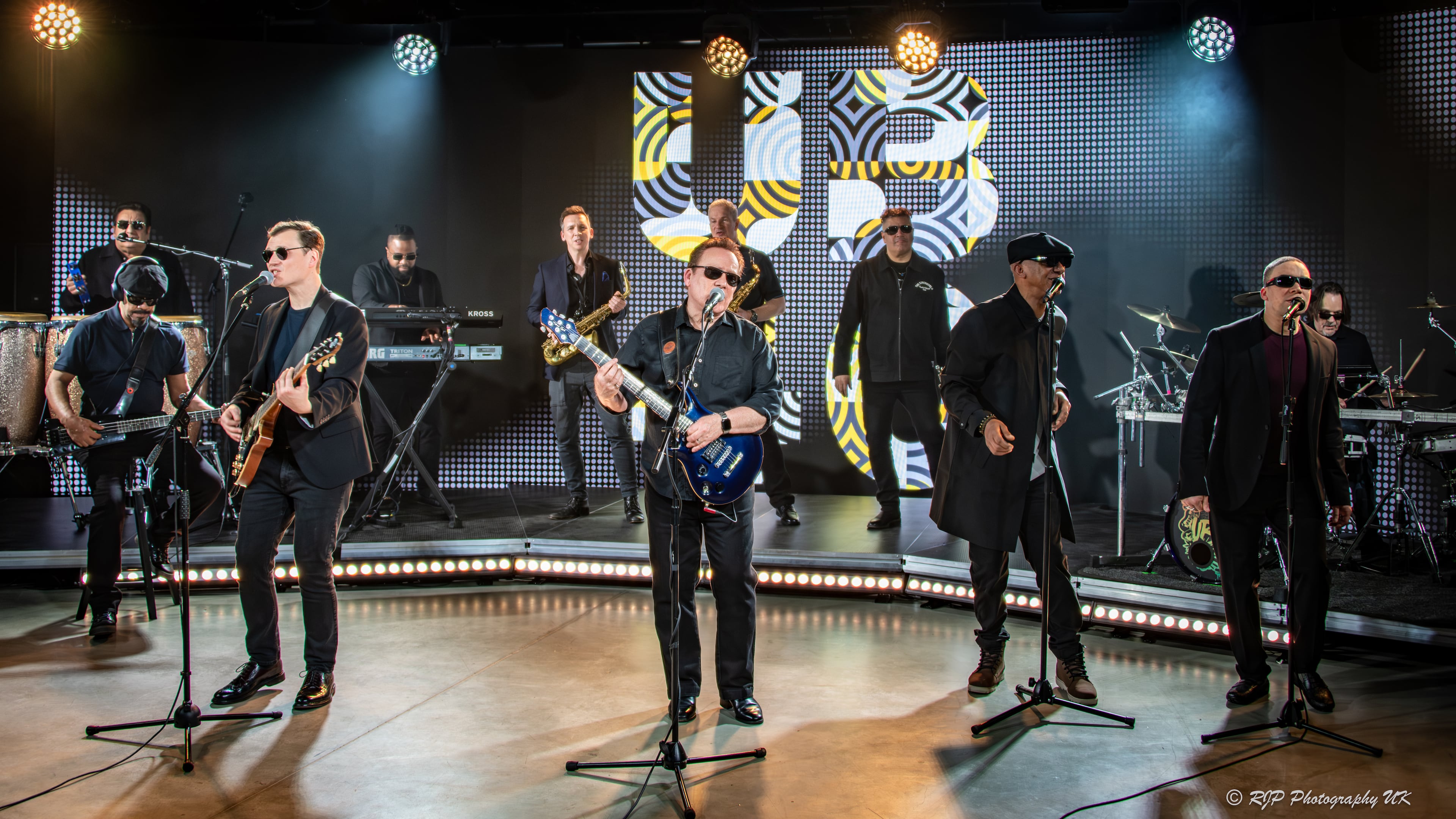 Matt Doyle (left foreground) is the new lead singer on a tour that brings the venerable British reggae-pop band UB40 to Atlanta Symphony Hall on Sunday. (Courtesy of Richard Purvis)