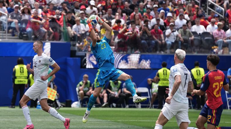 Spain goalkeeper Unai Simon (23) makes a save during the World Cup round of 32 soccer match between Spain and Austria in Inglewood, Calif., near Los Angeles, Thursday, July 2, 2026. (AP Photo/Jae C. Hong)