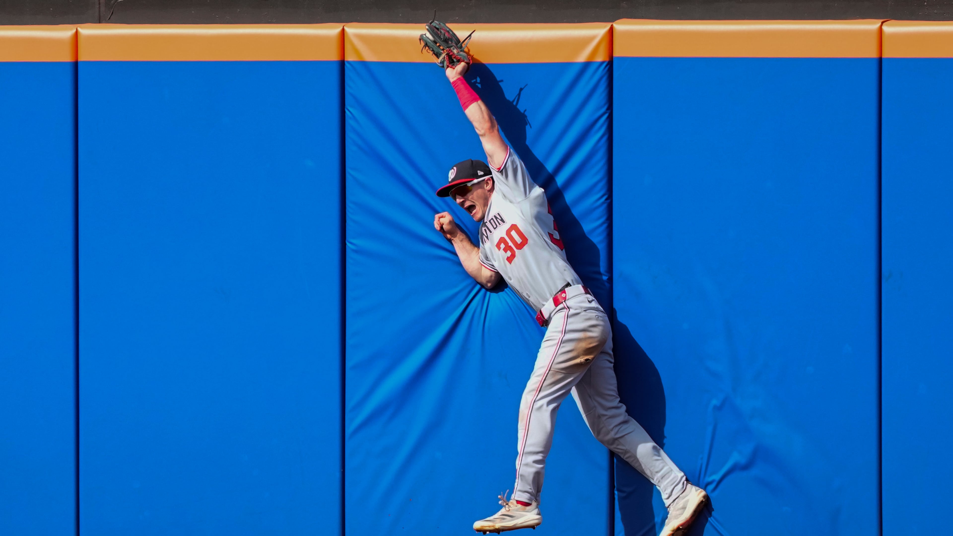 Washington Nationals outfielder Jacob Young catches a fly ball hit by New York Mets' Brett Baty during the fifth inning of a baseball game Sunday, Sept. 21, 2025, in New York. (AP Photo/Yuki Iwamura)
