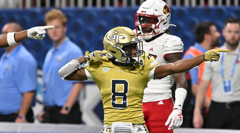 Georgia Tech's wide receiver Malik Rutherford (8) celebrates after running for a long first down run during the first half of the inaugural Aflac Kickoff Game at Mercedes-Benz Stadium, Friday, September 1, 2023, in Atlanta. Louisville won 39-34 over Georgia Tech. (Hyosub Shin / Hyosub.Shin@ajc.com)