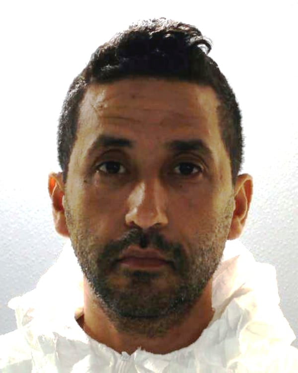This undated booking photo provided by the New York State Police shows Luciano Frattolin, who is charged with murder and concealing of a corpse in the death of his daughter, Melina Frattolin. (New York State Police via AP)