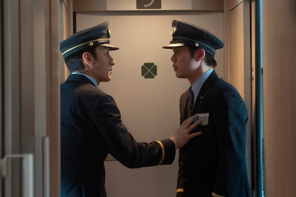 This image released by Netflix shows Tsuyoshi Kusanagi, left,and Kanata Hosoda in a scene from "Bullet Train Explosion." (Netflix via AP)