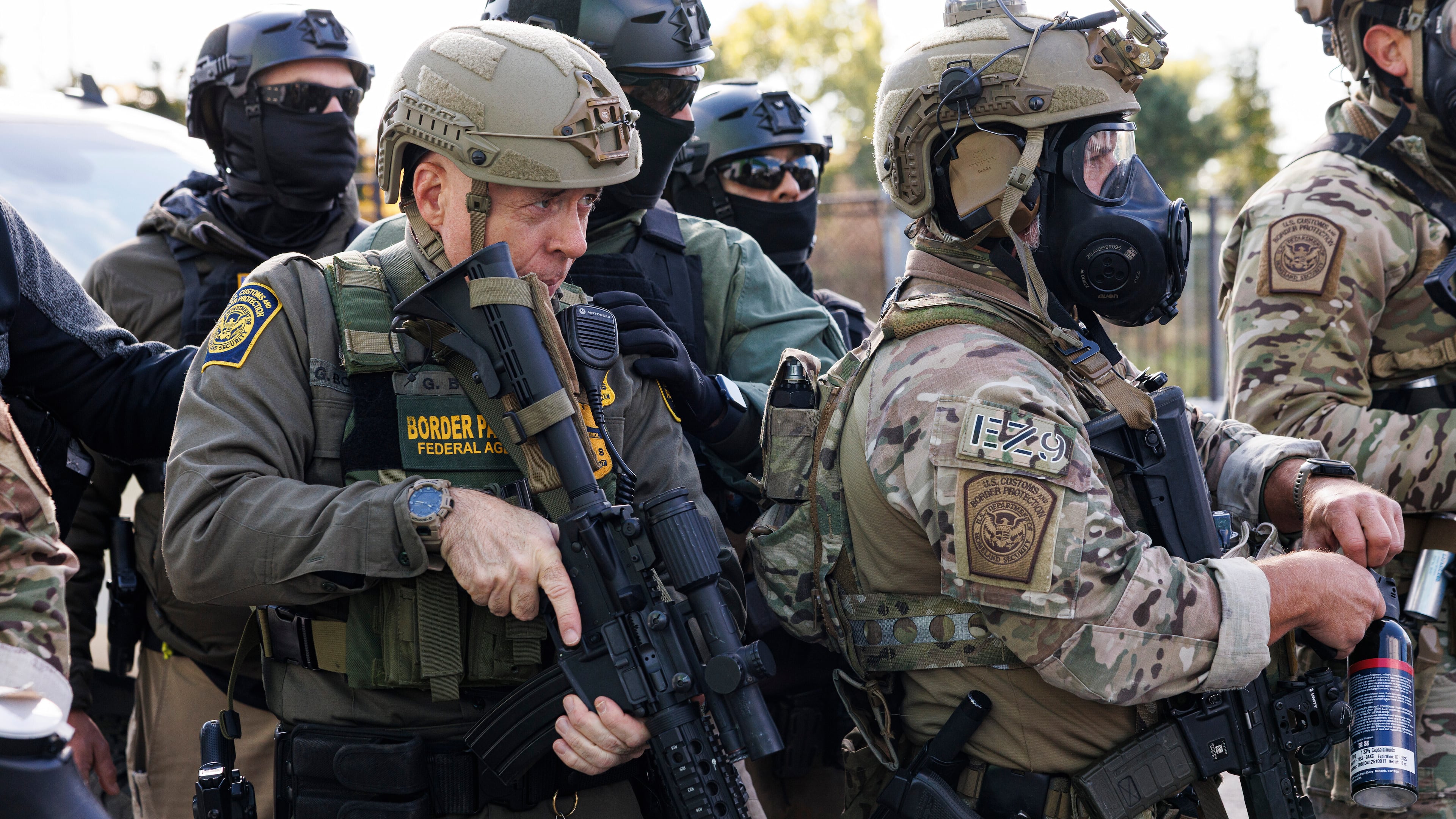 U.S. Border Patrol Commander-At-Large Gregory Bovino stands with federal immigration enforcement agents during a skirmish with protesters in Little Village neighborhood, Chicago Thursday, Oct. 23, 2025. (Anthony Vazquez/Chicago Sun-Times via AP)