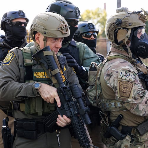U.S. Border Patrol Commander-At-Large Gregory Bovino stands with federal immigration enforcement agents during a skirmish with protesters in Little Village neighborhood, Chicago Thursday, Oct. 23, 2025. (Anthony Vazquez/Chicago Sun-Times via AP)