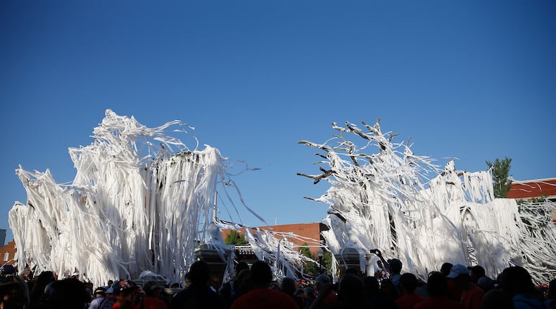 Toilet paper adorns the Auburn Oaks at Toomer's Corner Celebration on April 20, 2013 in Auburn, Ala.