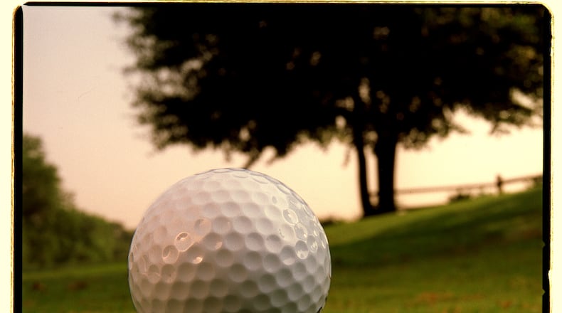 980528 ATLANTA, GA: Golf ball on tee. RICH ADDICKS/STAFF